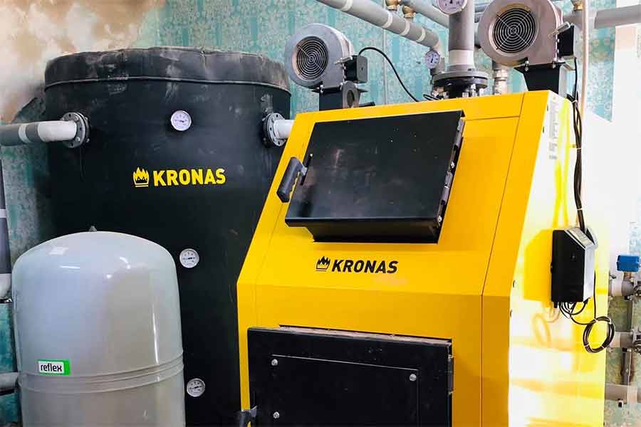 Твердопаливний котел у навчальному закладі Коломаччини